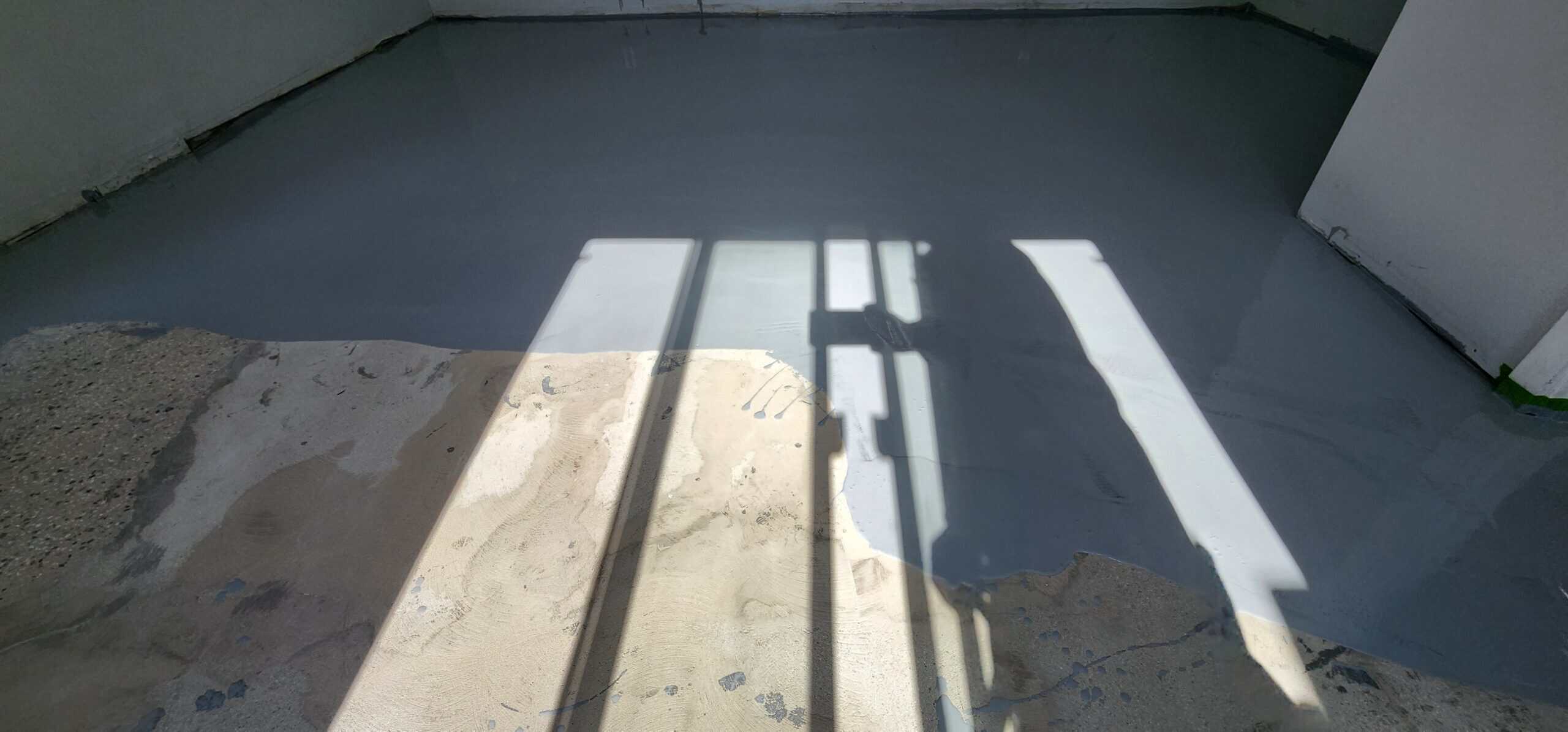 Concrete floor part-way through restoration