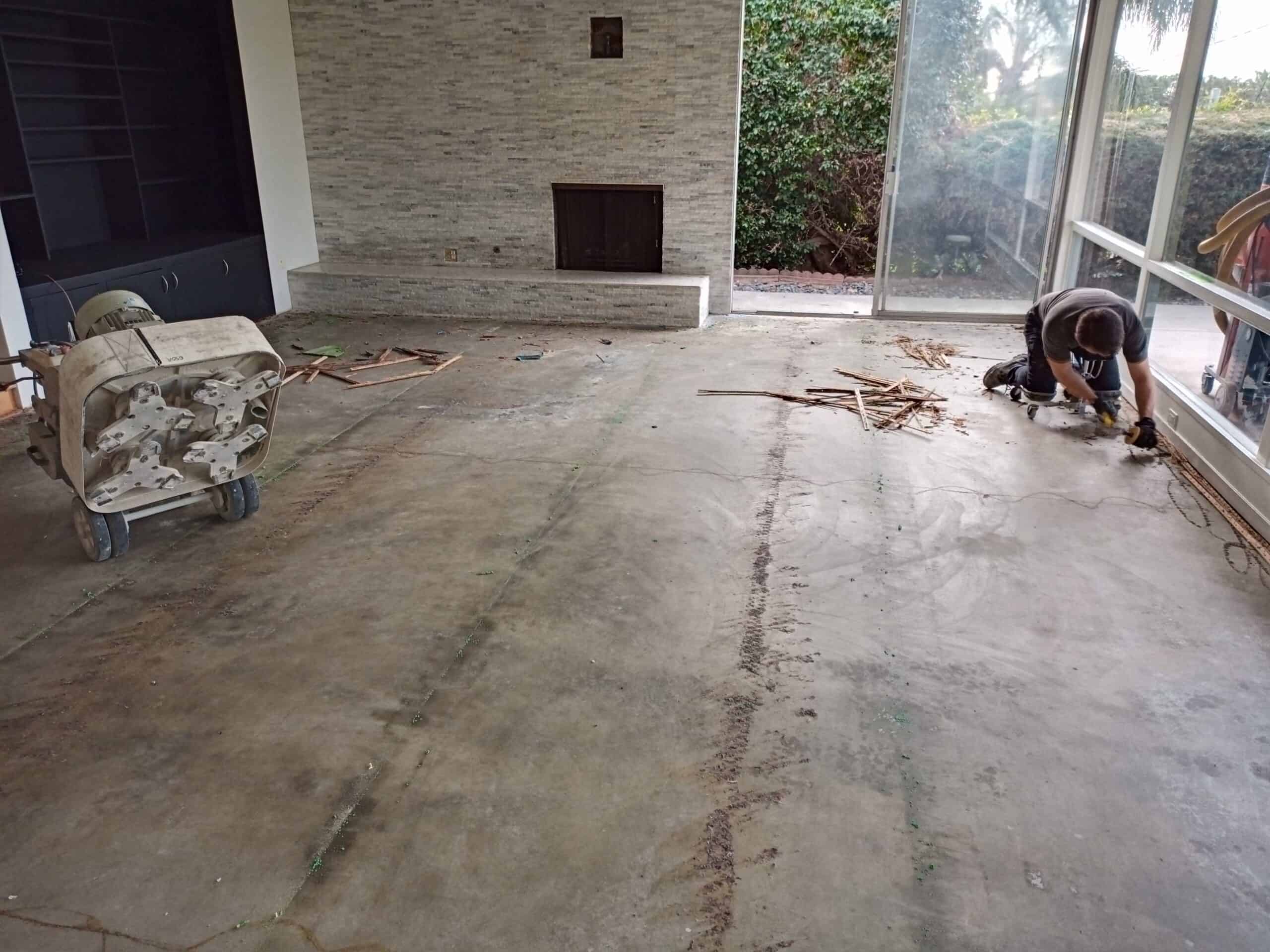 Residential concrete floor before grind and seal