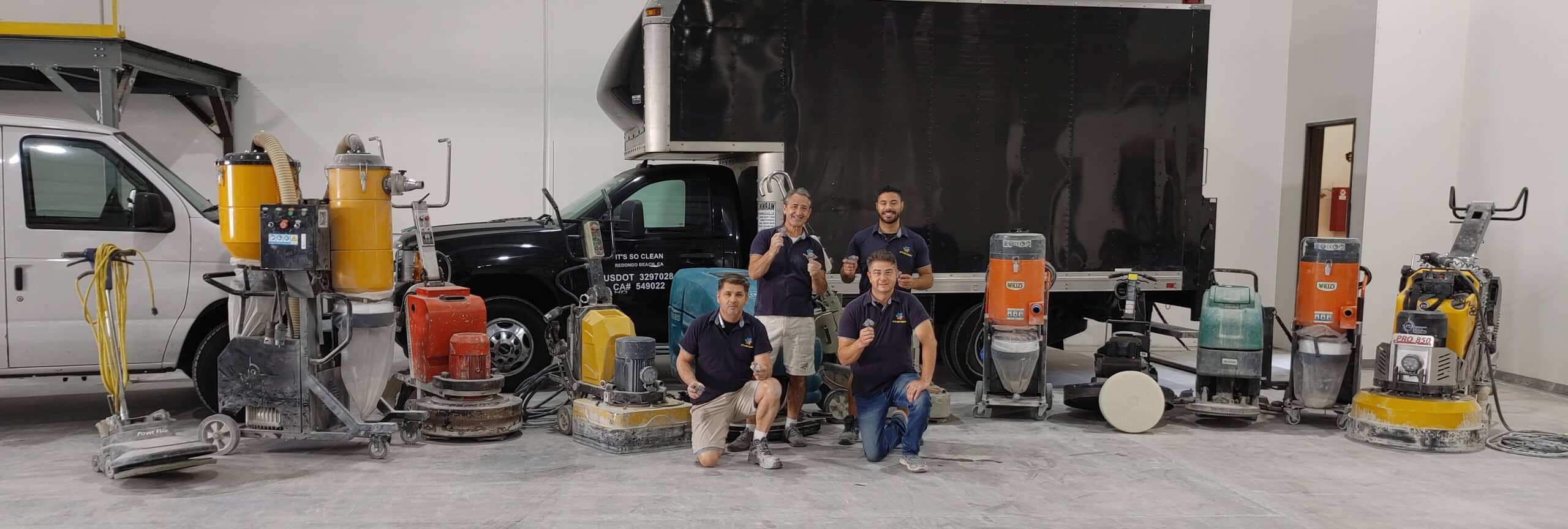 The IT'S SO CLEAN crew with the company grinders, polishers, dust extraction units and trucks