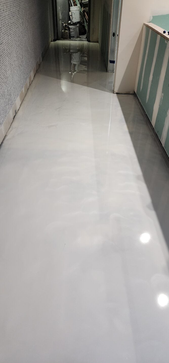 Pale cream metallic epoxy in the customer area