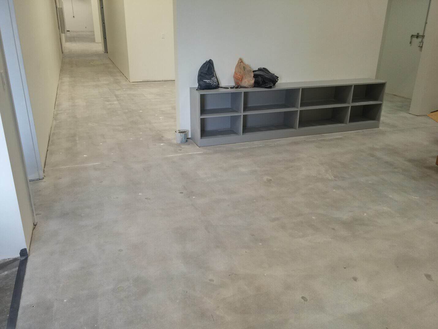 Corridor and stainless casework before the floor was coated