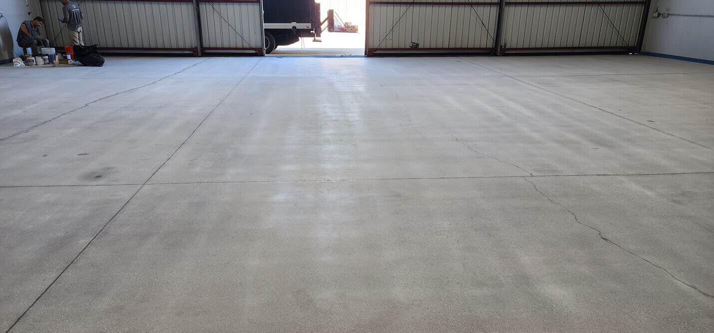 Cracking through the hangar floor panels