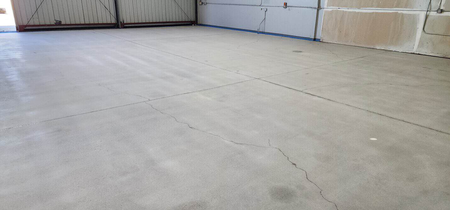 Hangar floor prepared and ground back