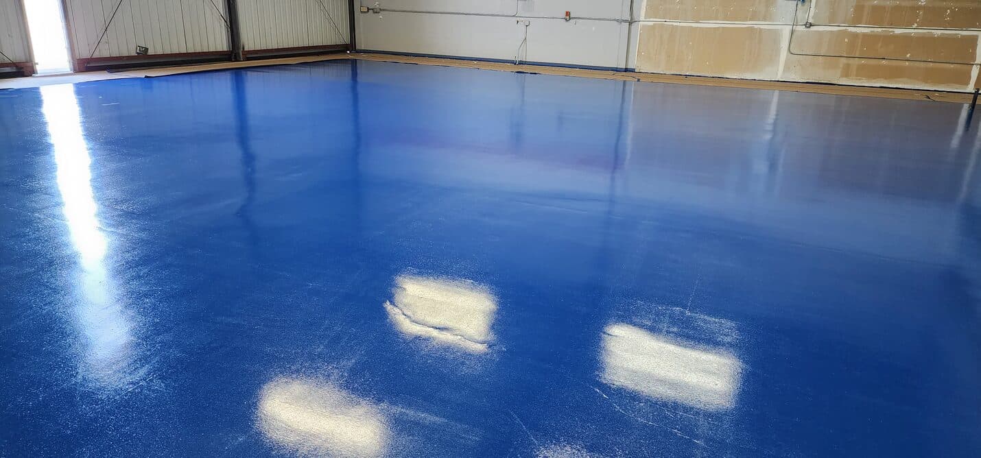 Finished hangar floor running the full width of the building