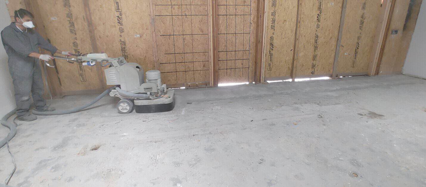 Crew breaking out the old floor build up