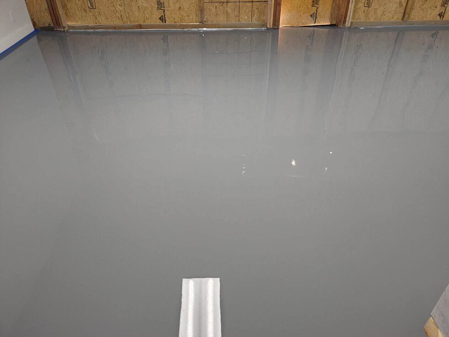 Grinding the slab flat before coating