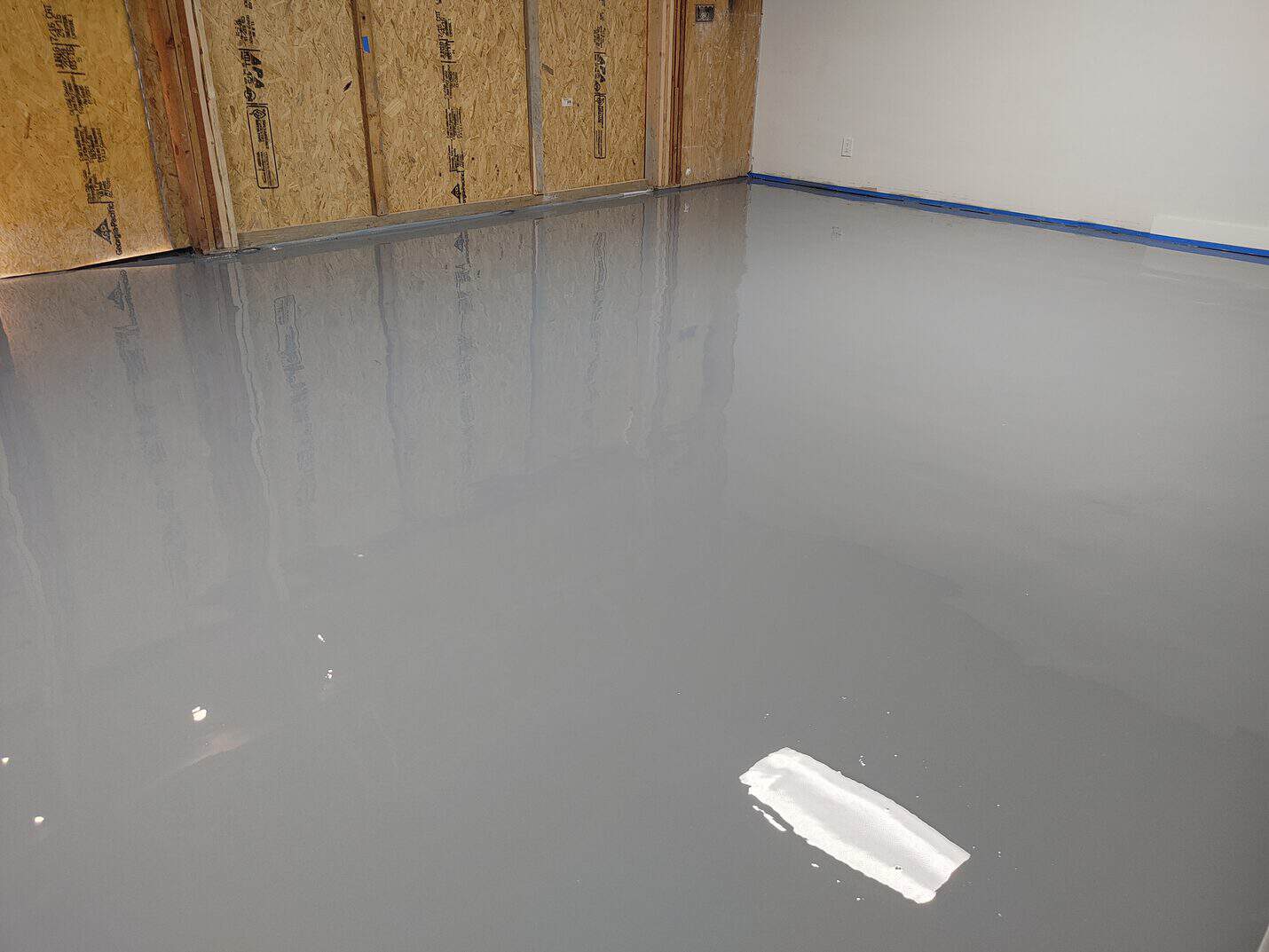 Mid grey solid colour epoxy floor in the finished coffee shop
