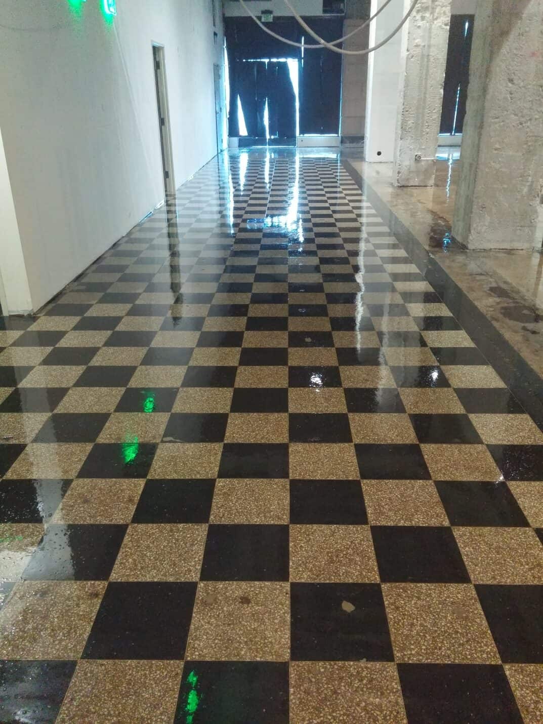 Restored checkerboard floor sealed with clear epoxy