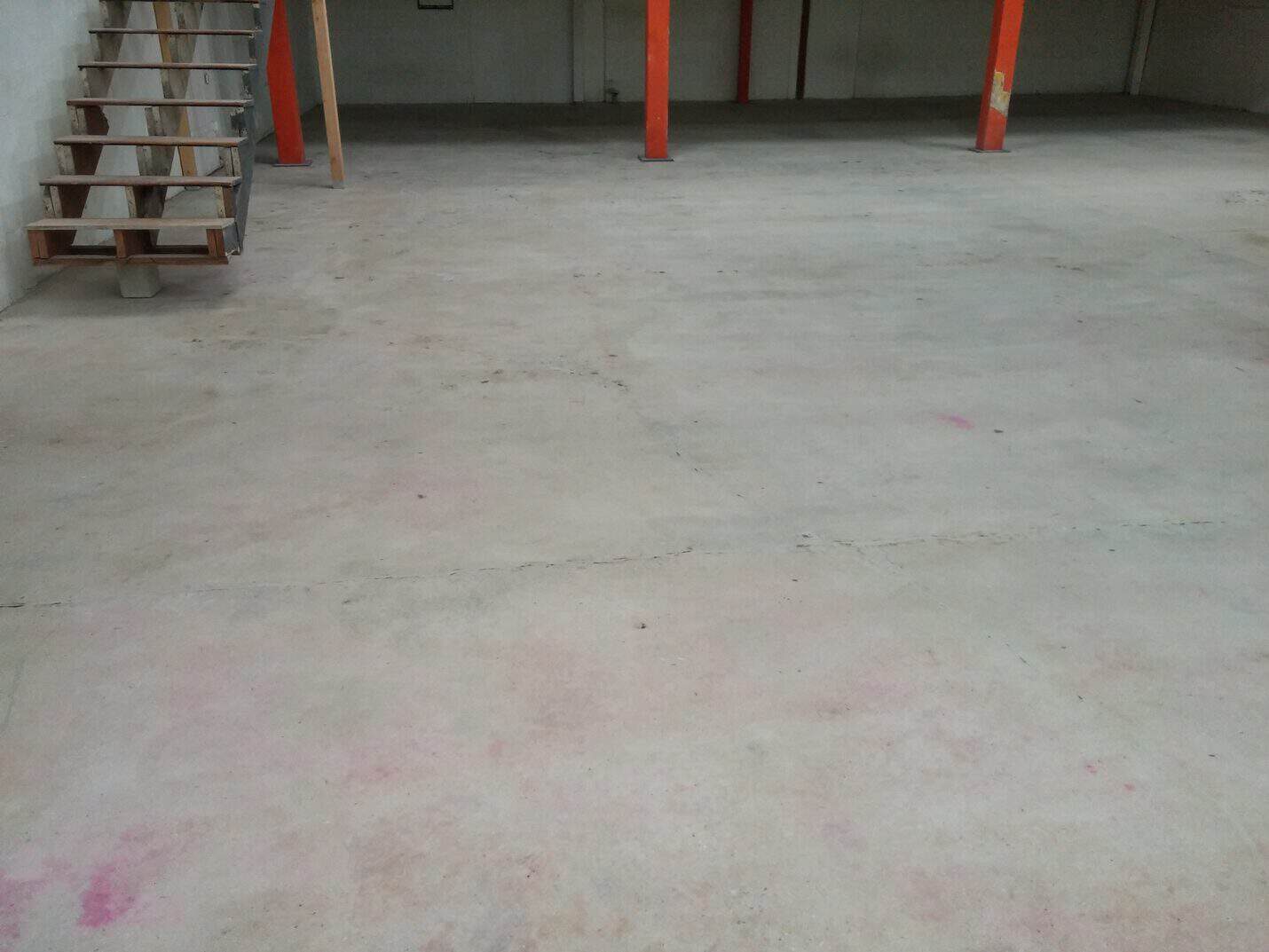 Coated studio floor showing the original character of the slab