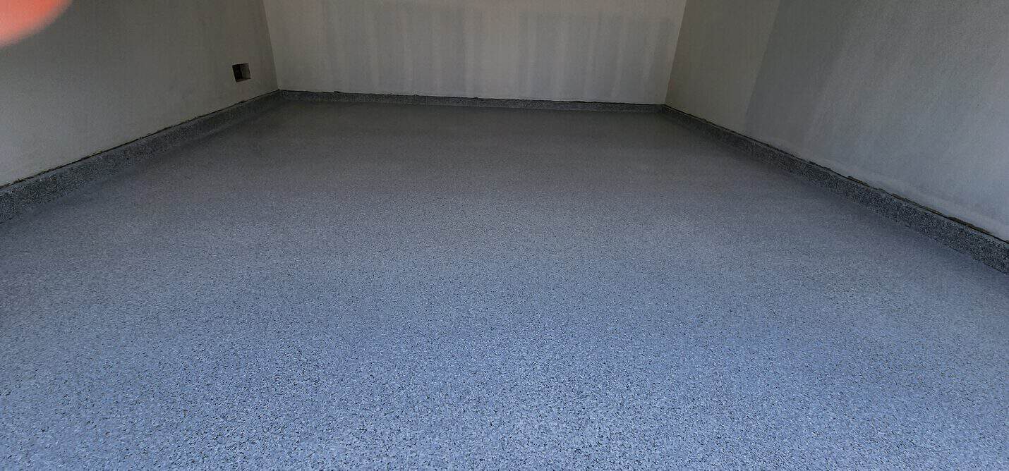 Grey, black and white flake epoxy garage floor in Hermosa Beach