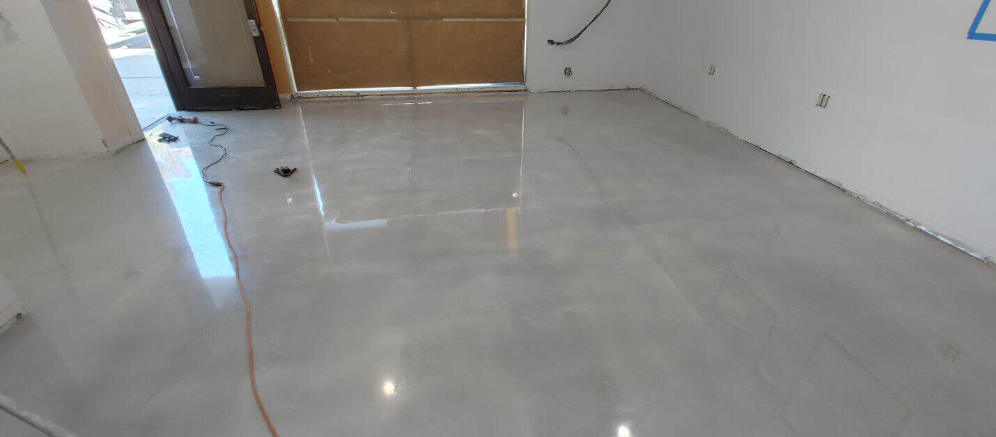Pale pearl metallic epoxy floor in the finished Beverly Hills salon