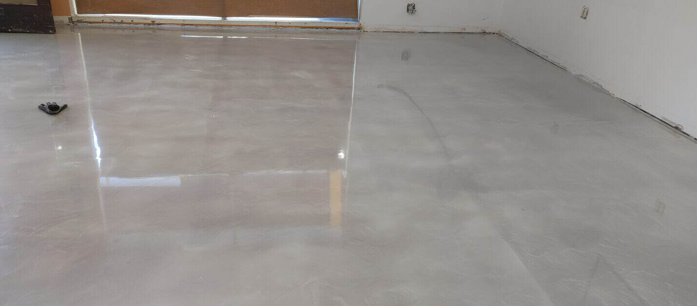 Metallic epoxy floor showing soft cloud movement in the pigment