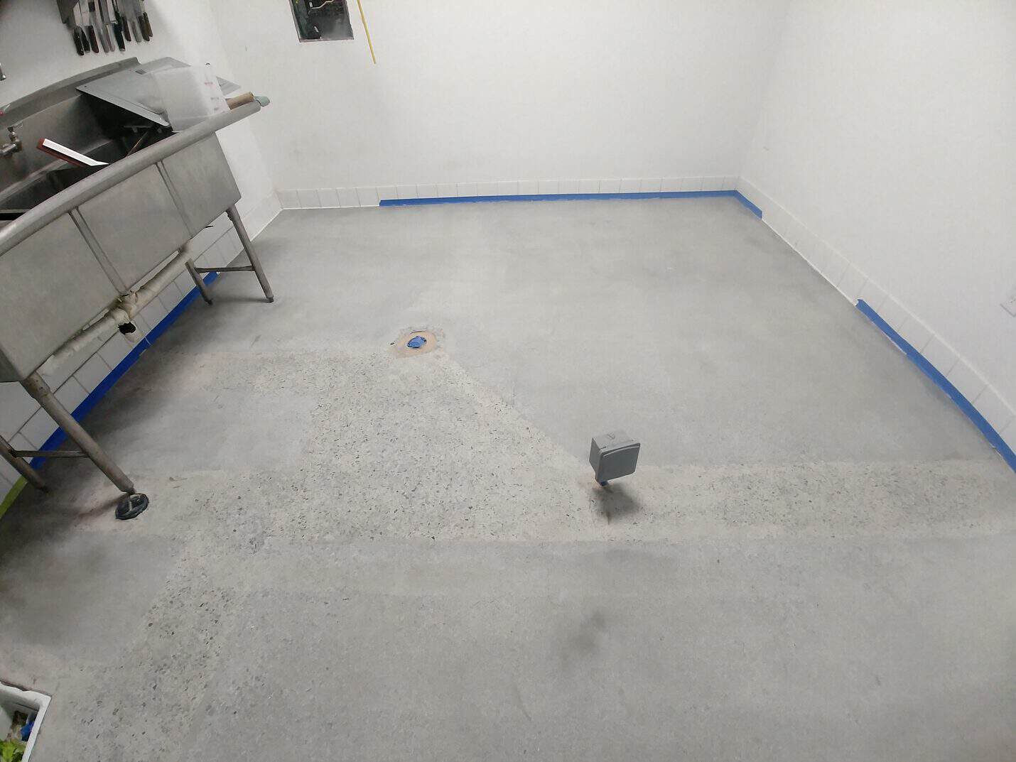 Floor drain and prepared slab before the coating went down