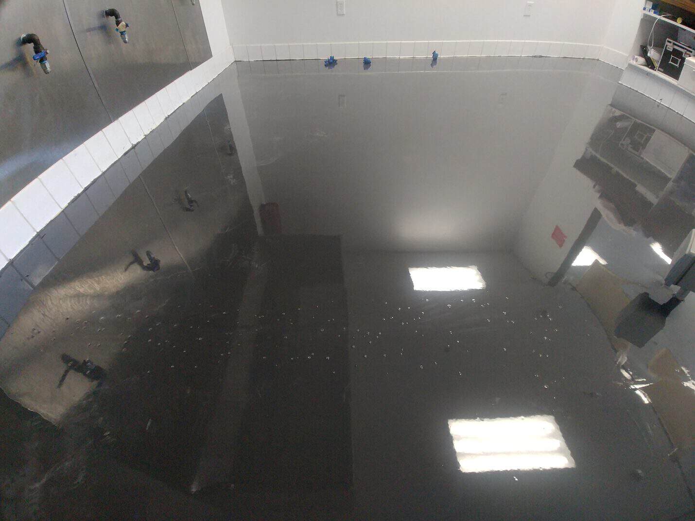 Finished kitchen floor laid to the drain