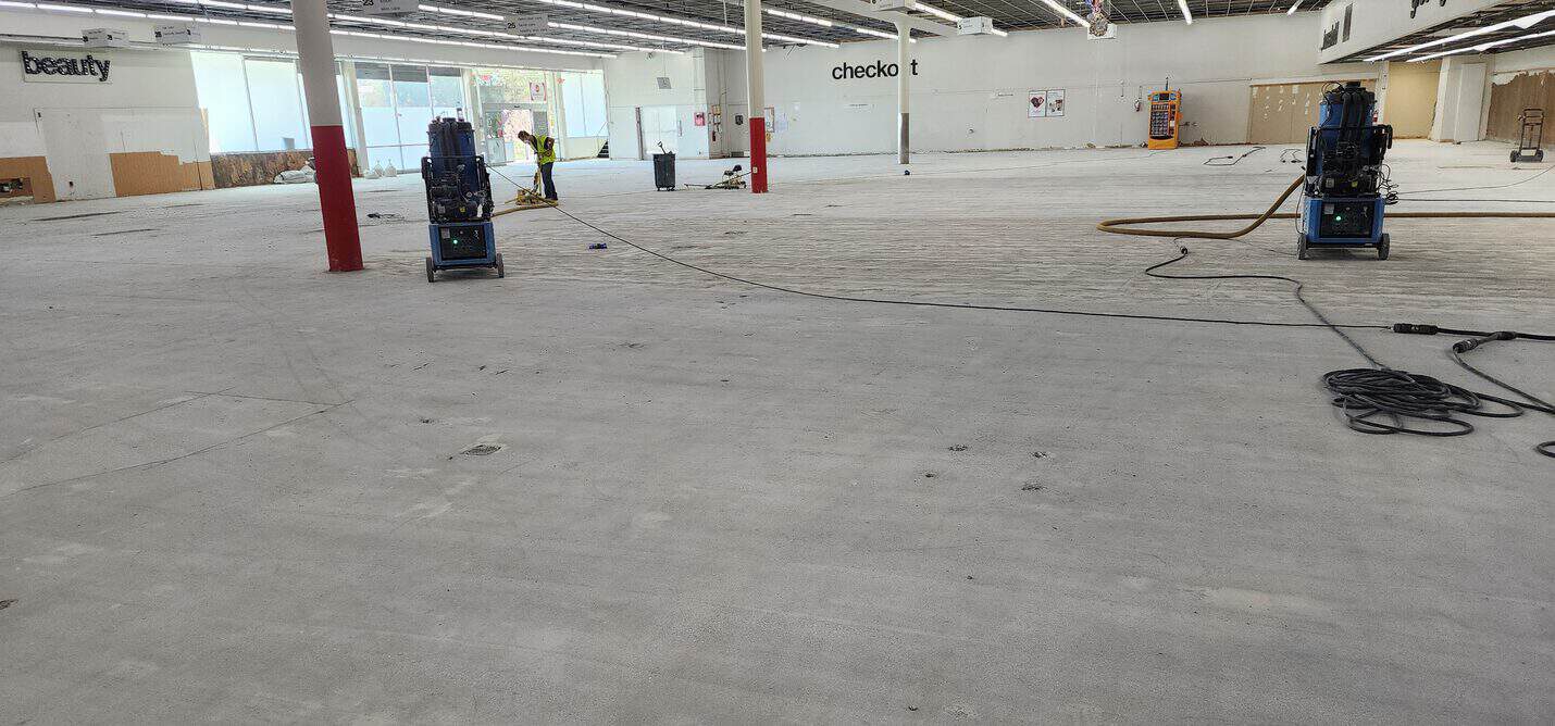 Concrete grinders running on the stripped slab, CVS Pacific Palisades (3 of 10)
