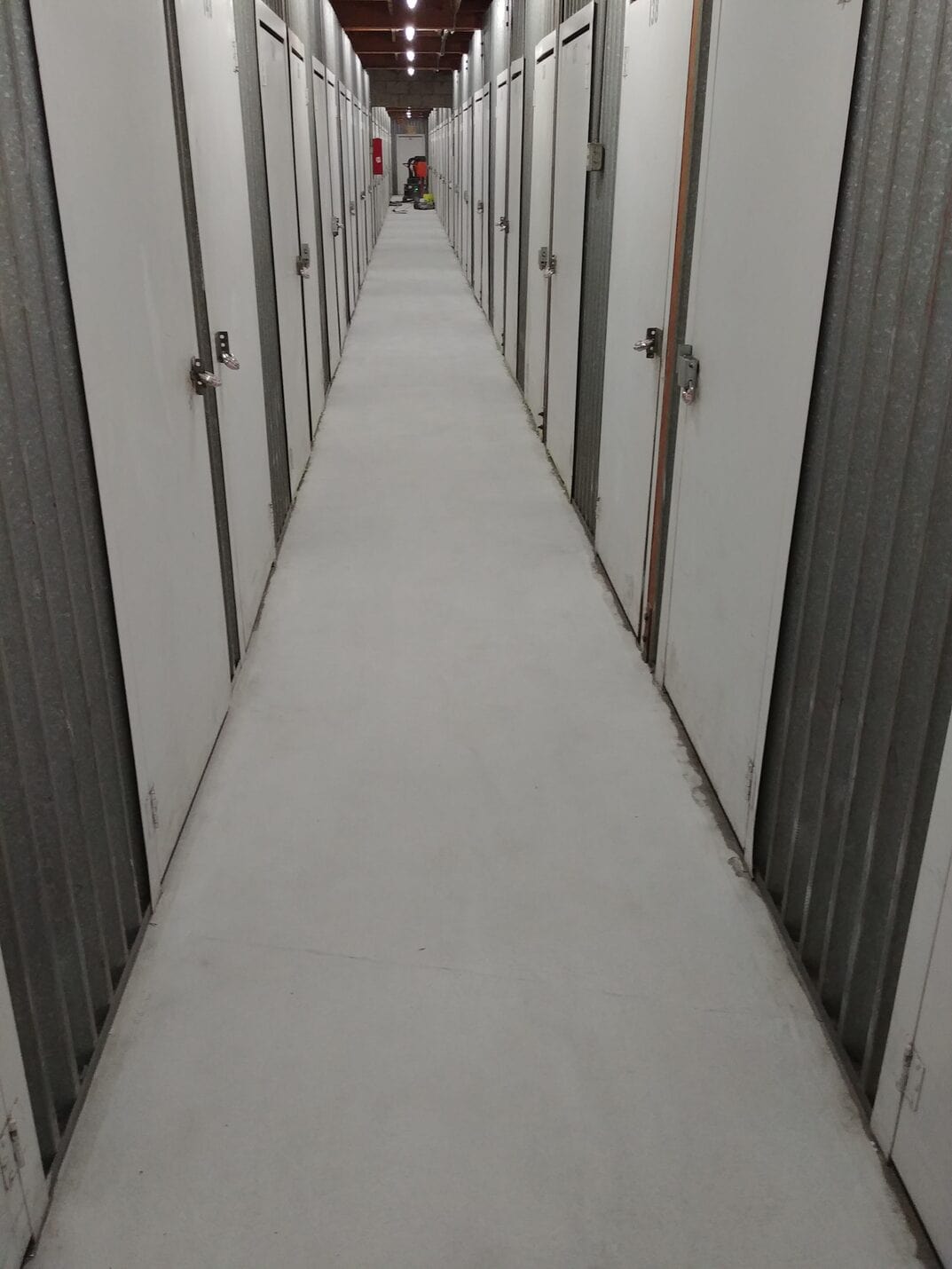 Polished corridor between roll-up storage doors, Public Storage San Francisco (3 of 6)