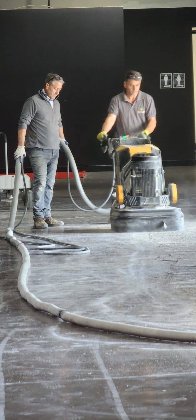 Crew grinding the coating off the lobby floor, Thunder Studios Long Beach (5 of 9)